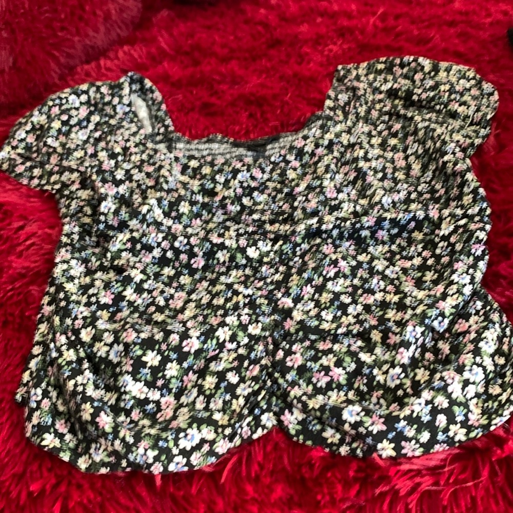 This top is black with flowers brand name BCX